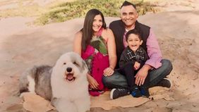 Suneel Garg with his family on the beach.