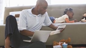 Man considering the advantages and disadvantages of life insurance.