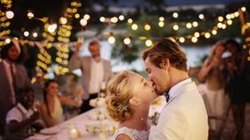Young couple kissing during wedding