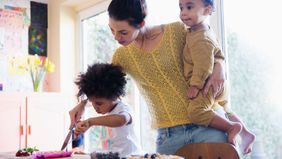 nanny preparing breakfast for kids