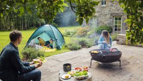 family enjoying new patio that increased home’s resale value