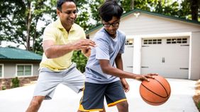 father and son thinking about setting up a custodial roth ira