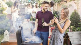 Couple at a backyard barbeque