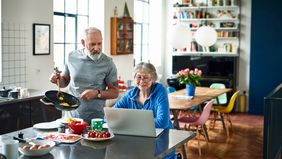 couple calculating retirement income together