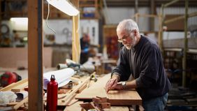 man working at a job while he’s on Social Security