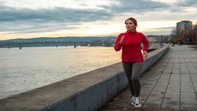 A jogger out on a cloudy day thinks about the cost of divorce