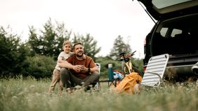 boy and dad camping