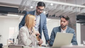 A Northwestern Mutual Wealth Management team in Milwaukee collaborating on a comprehensive financial plan and investment strategy to help clients achieve long-term financial security.