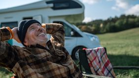 happy-senior-man-camping