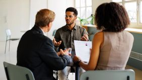 Northwestern Mutual financial advisor discusses markets and economy with clients 