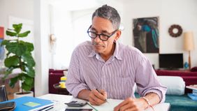 Investor reviewing his portfolio asset allocation