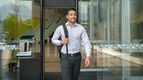 businessman leaving office