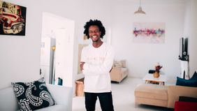 man standing in apartment