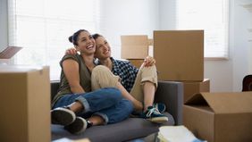 new homeowners in living room