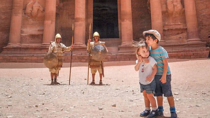 2 children in Petra, Jordan after a hike