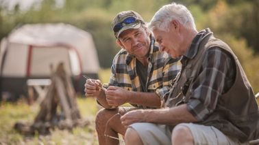 Father and son discussing the true cost of long-term care