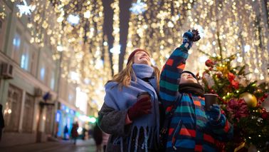 Mother and son explore holiday market while enjoying confidence in their financial plan with Northwestern Mutual.