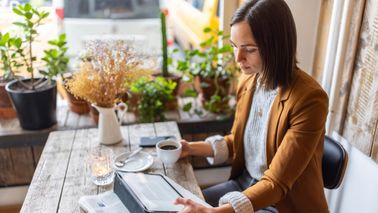 woman reading about declining markets