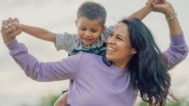 Mother feeling confident about her family’s financial future thanks to the advice of her Northwestern Mutual financial advisor.