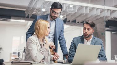 A Northwestern Mutual Wealth Management team in Milwaukee collaborating on a comprehensive financial plan and investment strategy to help clients achieve long-term financial security.