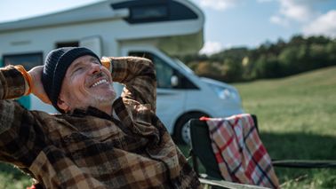 happy-senior-man-camping