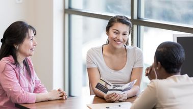 mother-helping-daughter-prepare-for-financial-independence