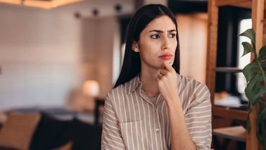 Woman thinking through a decision.