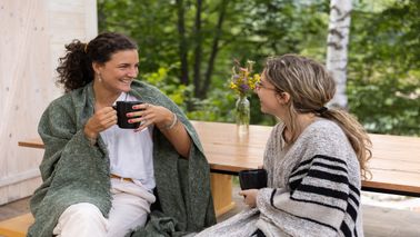 two friends enjoying morning coffee