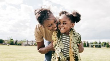 mother and daughter outside