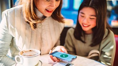 A parent and child deal with money