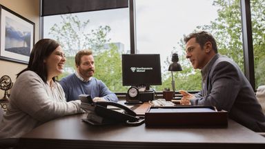 NM-clients-discussing-privacy-with-advisor