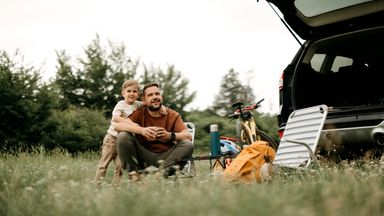 boy and dad camping