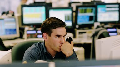 Man thinking about what he read in Northwestern Mutual Weekly Market Commentary.