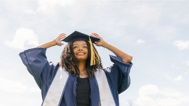Young woman celebrates high school graduation as she prepares for college 