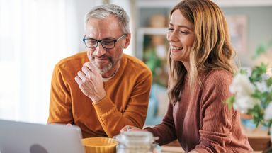 Couple has breakfast while enjoying video call