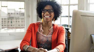 Woman in an office taking a skills assessment quiz