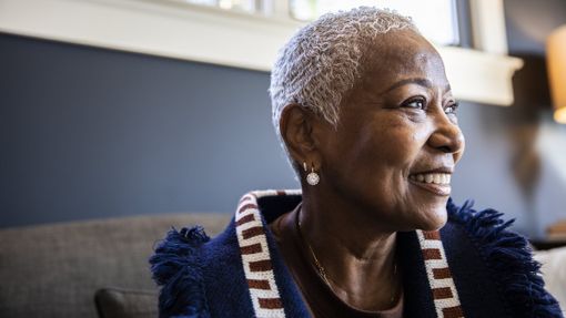 Affluent woman feeling confident about her future thanks to a solid financial plan.