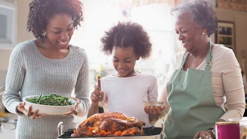 three-generations-of-women-cooking-together-in-kitchen