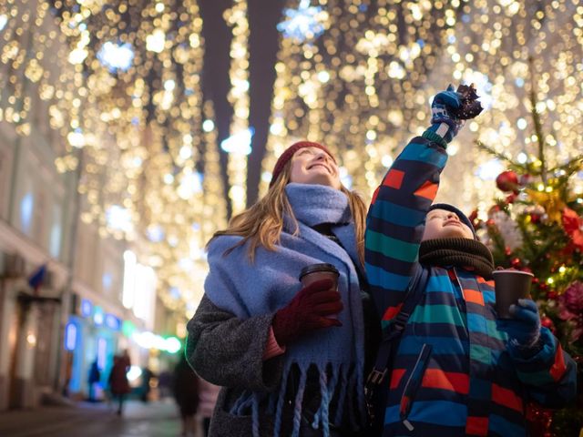 Mother and son explore holiday market while enjoying confidence in their financial plan with Northwestern Mutual.