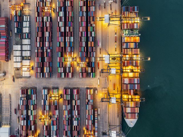 containership docked at a shipping port