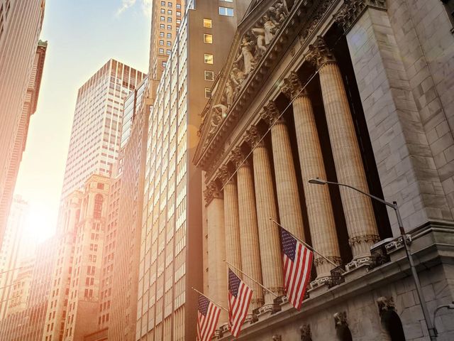 Sun shining on Wall Street.