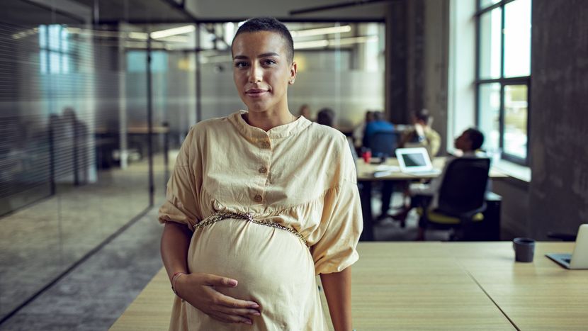 Pregnant woman in an office