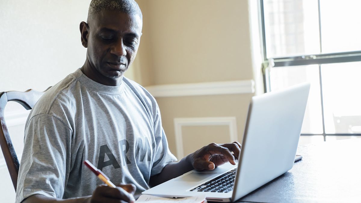 Man researching life insurance for veterans