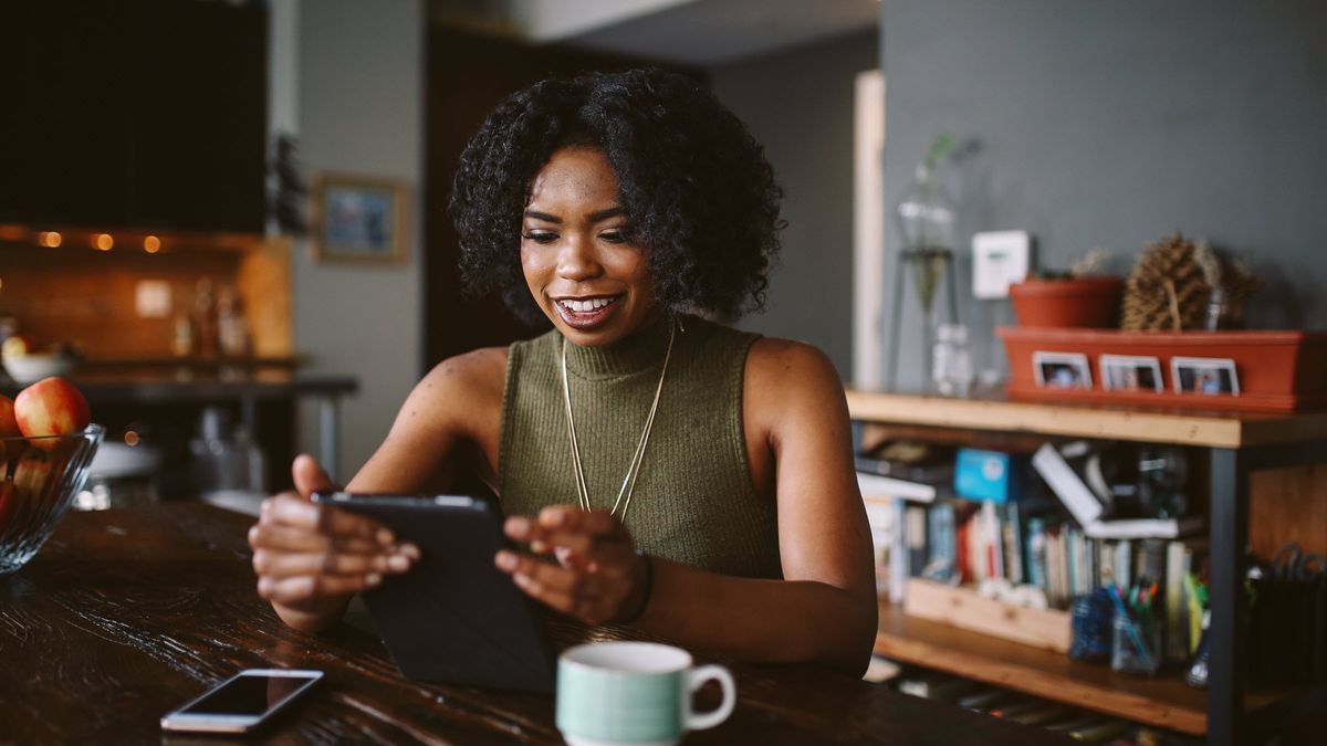 Woman reading Northwestern Mutual Market Commentary