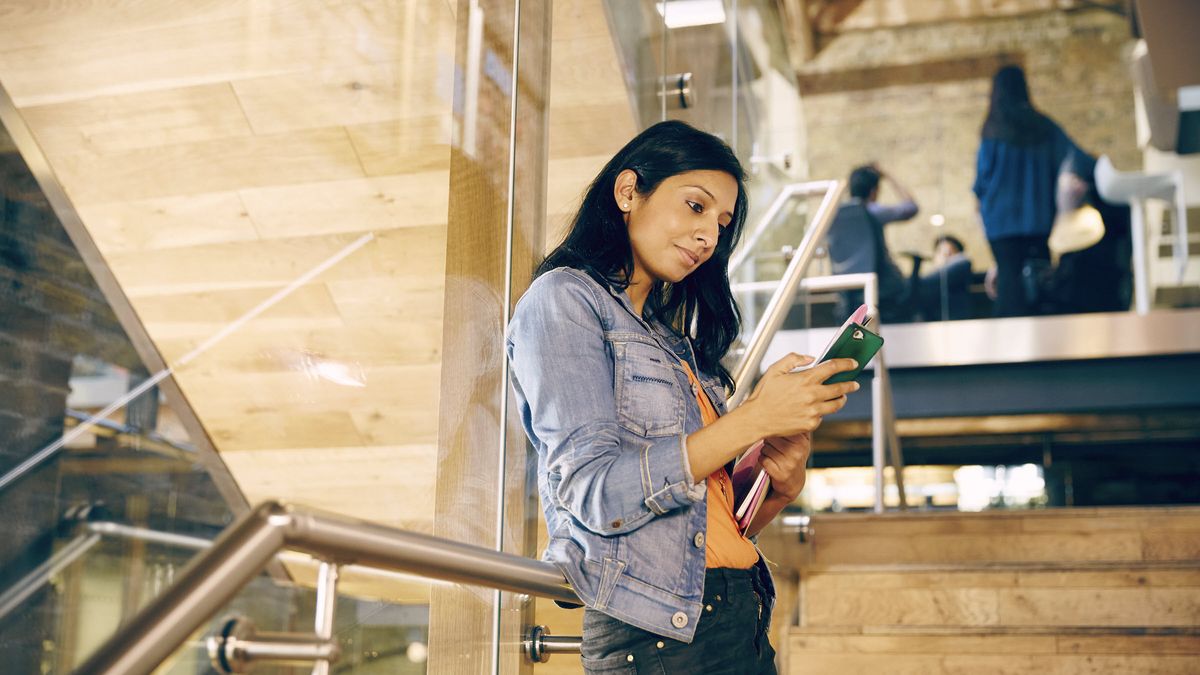 Woman reading Northwestern Mutual Market Commentary