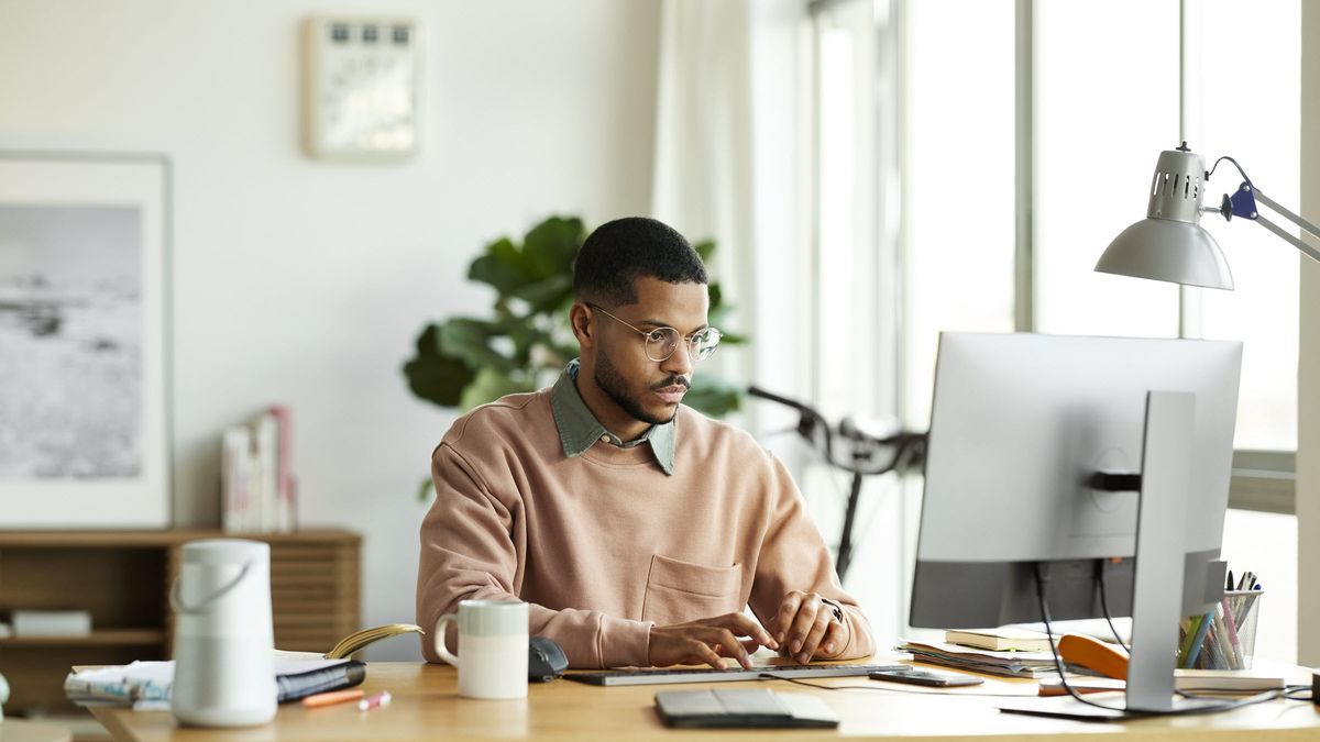 Man reading Northwestern Mutual Market Commentary