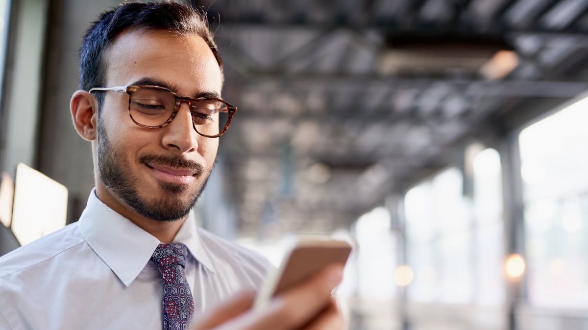 Man reading Northwestern Mutual Market Commentary