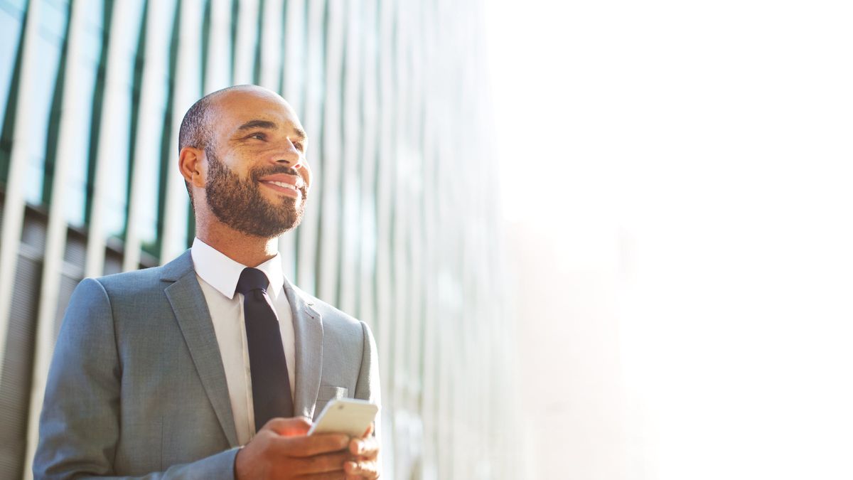 Man standing outside looking into the distance after reading Northwestern Mutual Market Commentary