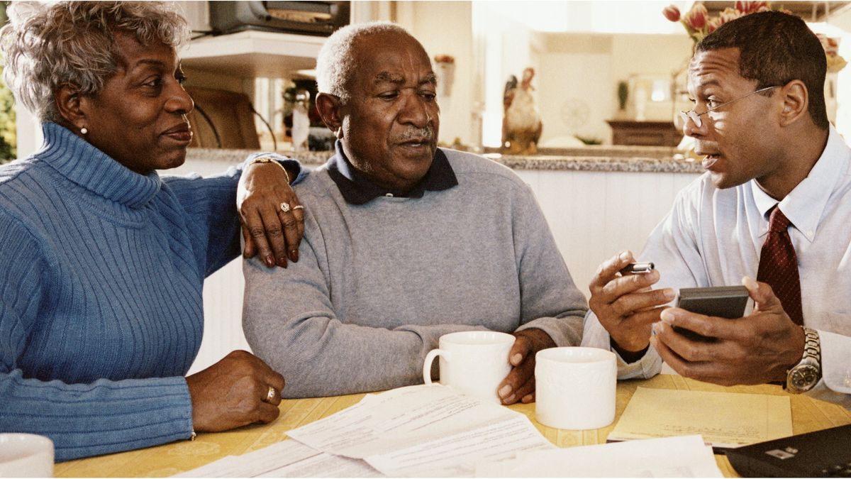 Couple discussing the 4 percent rule with their financial advisor