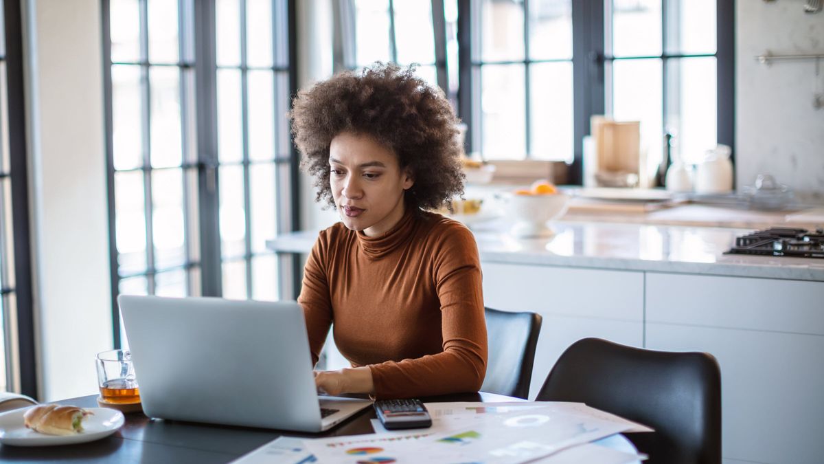 Woman reading Northwestern Mutual Market Commentary